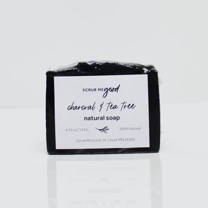 Close-up of charcoal and tea tree soap bar for men